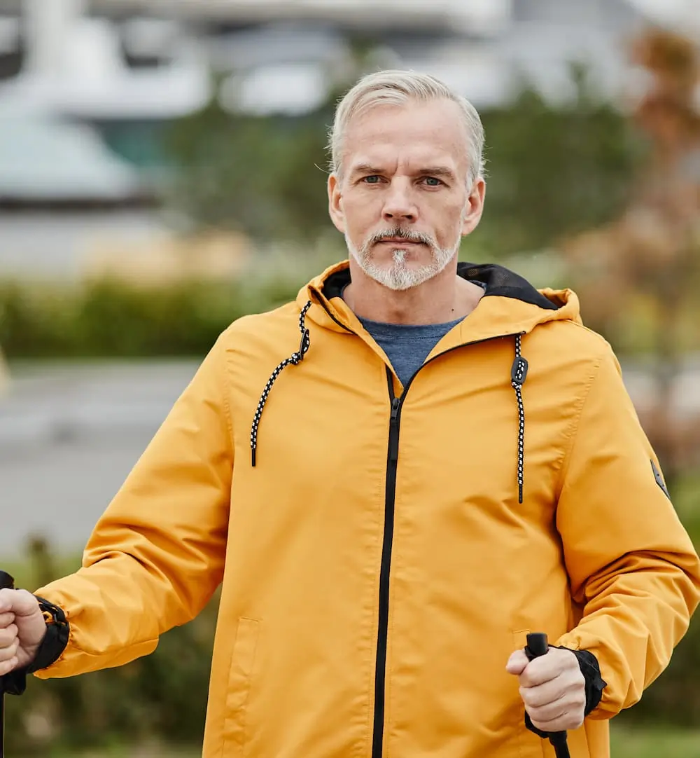 Senior man outdoors looking energetic and healthy